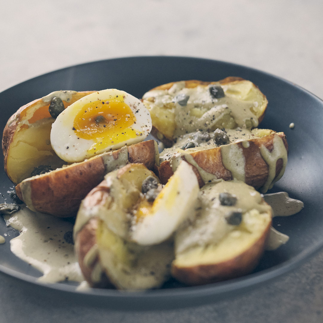 Baked potatoes with tonnato sauce and soft boiled egg